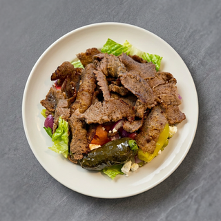 Gyro Served Over Greek Salad